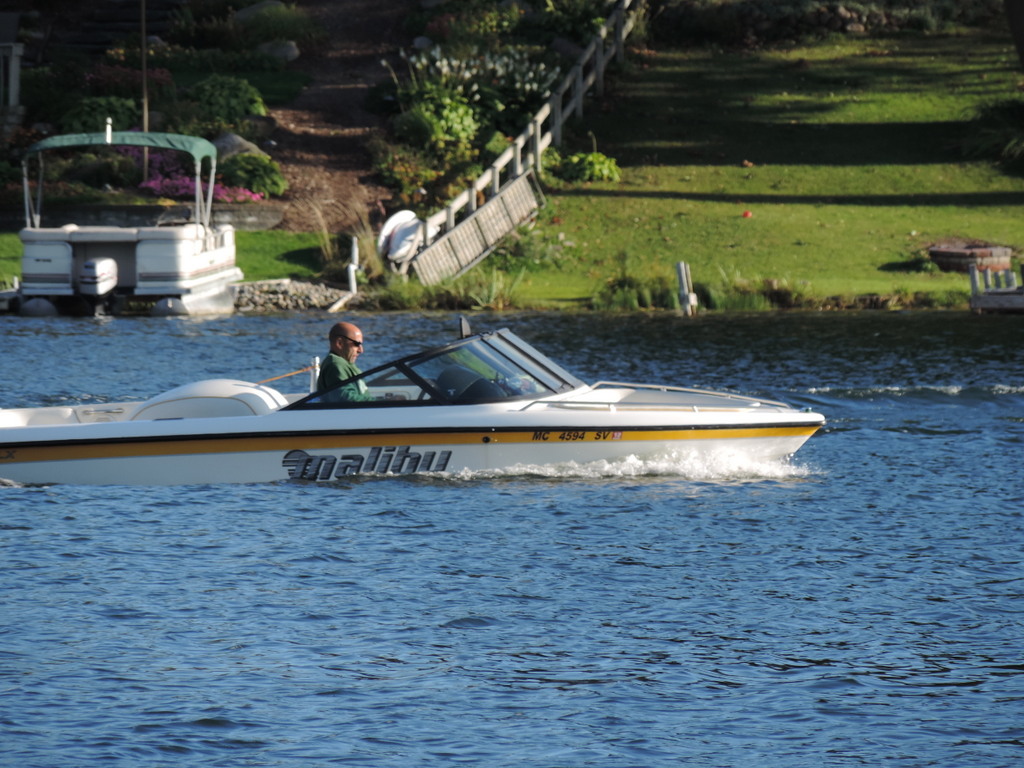Boating on Scott Lake in Oakland County Michigan